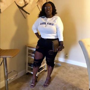 Black distressed Bermuda shorts